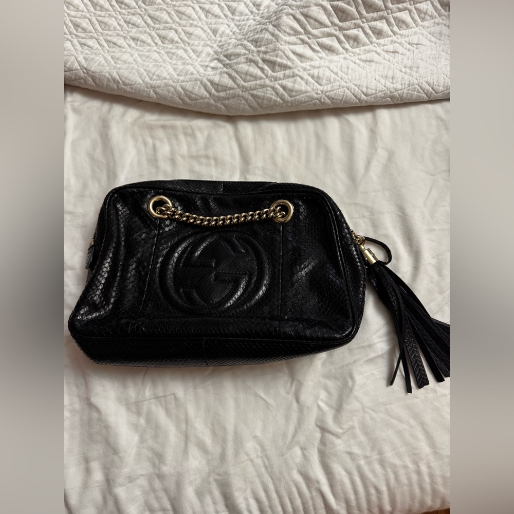 Gucci Black and Gold Luxury Clutch